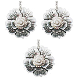 Black mother of pearl flower pendant with silver color metal